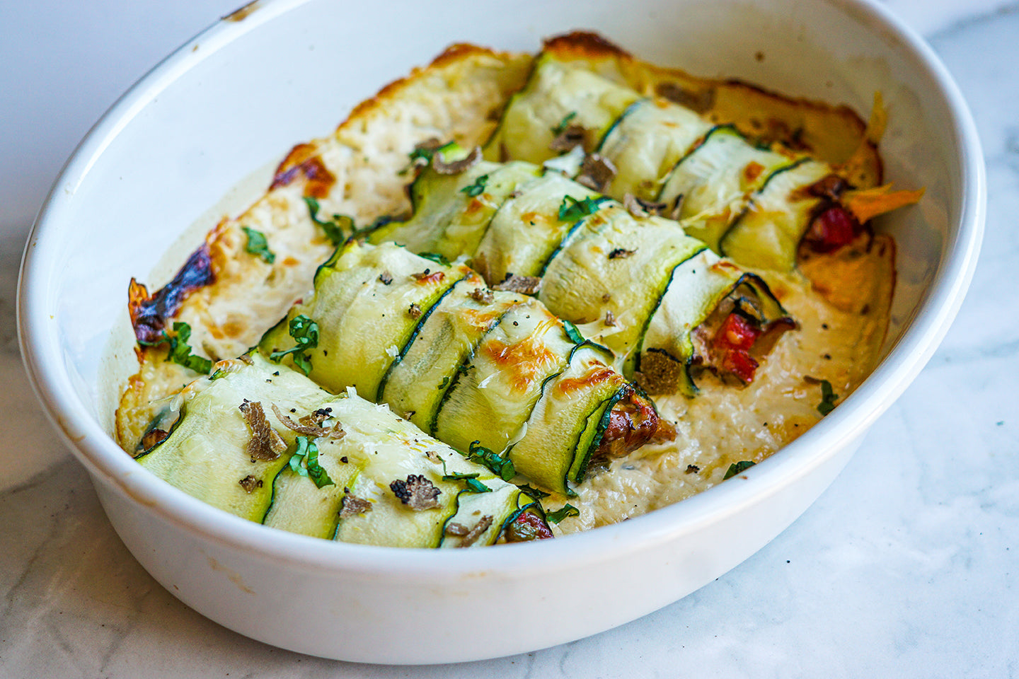 Canelones de calabacín rellenos de crema de rebozuelo