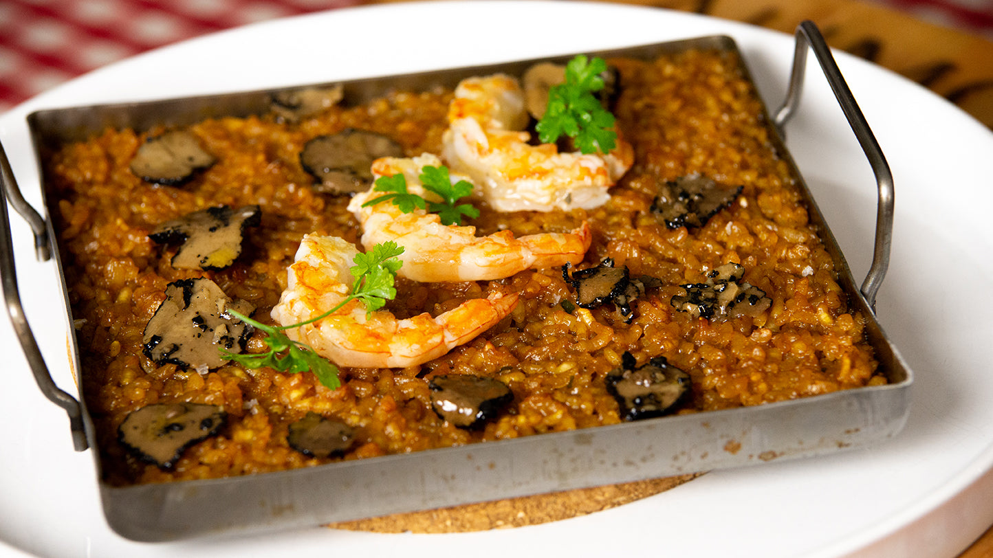 Arroz con carpaccio de trufa de verano, gambas y verduras